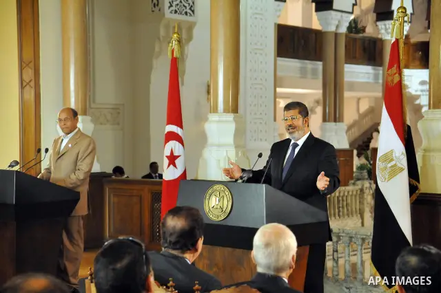 Egyptian President Mohamed Morsi (R) and his Tunisian counterpart Moncef Marzouki (L) attend a joint press conference at the Presidential Palace in Cairo on July 13, 2012. The post-uprising presidents of Egypt and Tunisi...