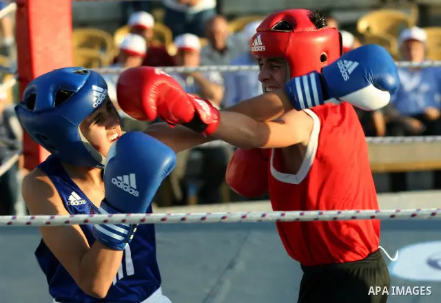 Palestinian boxing players fight during a friendly match in the West Bank city of Nablus, on 13 July 2012. Palestinian boxing union built a new international racetrack in Nablus. Photo by Nedal Eshtayah