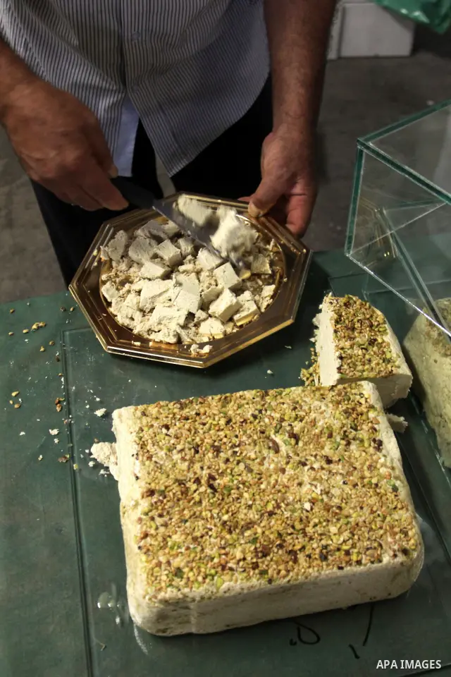 Palestinians participate in the opening of festival national products in the West Bank city of Nablus, on July, 14, 2012. Photo by Nedal Eshtayah