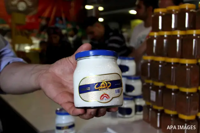 Palestinians participate in the opening of festival national products in the West Bank city of Nablus, on July, 14, 2012. Photo by Nedal Eshtayah