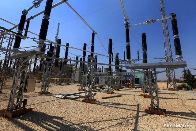 Palestinians workers work in energy company during maintenance work in Gaza city, on July 14, 2012. Photo by Majdi Fathi