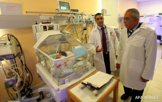 Palestinian Prime Minister, Salam Fayyad participate in the opening of new sections in the Holy Family Hospital in the West Bank city of Bethlehem, on July, 14, 2012. Photo by Mustafa Abu Dayeh