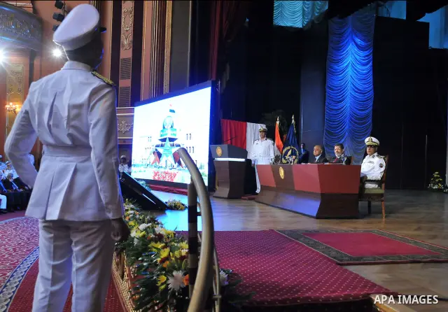 In this image released by the Egyptian Presidency, Egyptian President, Mohammed Morsi at a graduation ceremony at the Police Academy headquarters in Cairo, Egypt, July 14, 2012. The Police Academy was also the venue for...