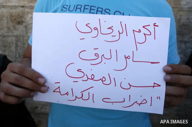 Palestinians take part a protest to calling of release of palestinian prisoners in Israeli jails whose are still refusing food for after a deal was made to end a mass prisoner hunger strike, during a demonstration in the...