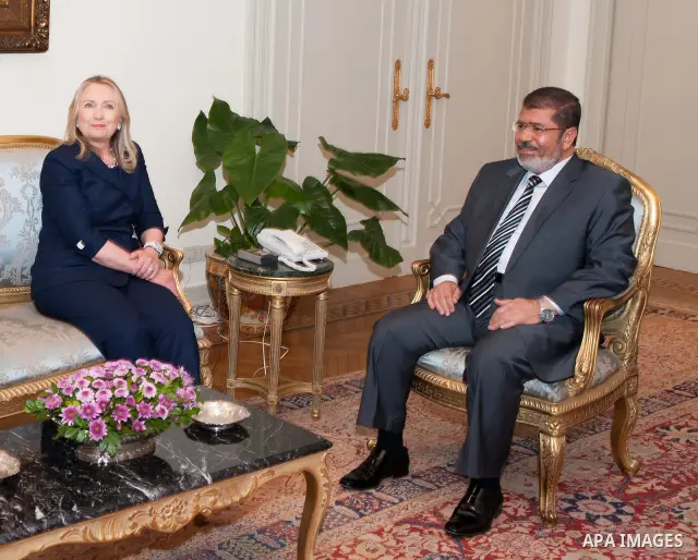 CAIRO, July 14, 2012 Egyptian President Mohamed Morsi (R) meets with visiting U.S. Secretary of State Hillary Clinton at the presidential palace in Cairo, Egypt, July 14, 2012. (Xinhua/Li Muzi) (Credit Image: © Li Muzi/X...