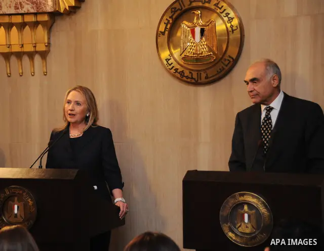 Egyptian Foreign Minister Mohammed Kamel Amr holds a joint press conference with US Secretary of State Hillary Clinton in Cairo on July 14, 2012. Clinton arrived in Cairo for talks with new Egyptian President Mohamed Mor...