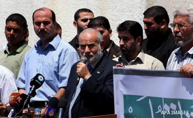 The spokesman of Hamas Parliament, Ahmed Bahar, delivers speech during a protest against political arrests by the security forces in the West Bank, Gaza City on July 15, 2012. Photo by Ashraf Amra