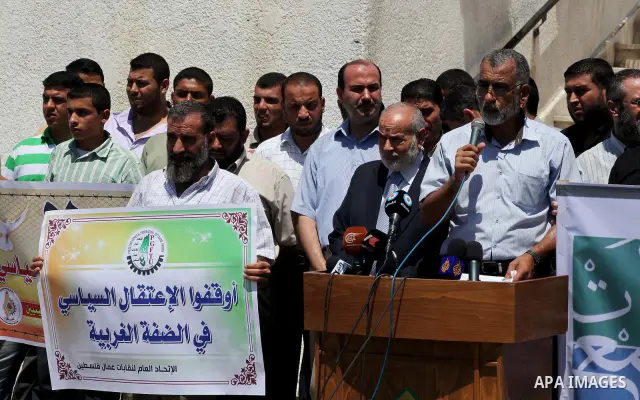 The spokesman of Hamas Parliament, Ahmed Bahar, delivers speech during a protest against political arrests by the security forces in the West Bank, Gaza City on July 15, 2012. Photo by Ashraf Amra