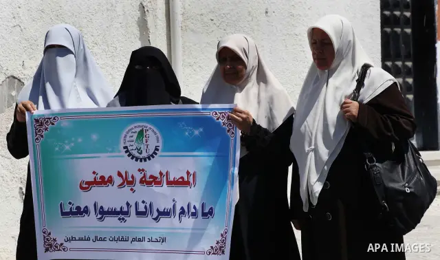 Palestinian trade unions and members legislative council participate a protest against political arrests by the security forces in the West Bank, Gaza City on July 15, 2012. Photo by Ashraf Amra