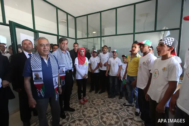 Palestinian Prime Minister Salam Fayyad visits "Palestine in sons of the martyrs eyes" summer camp, in the West Bank city of Jenin, al-Fari'ah refugee camp, on July 15, 2012. Photo by Mustafa Abu Dayeh