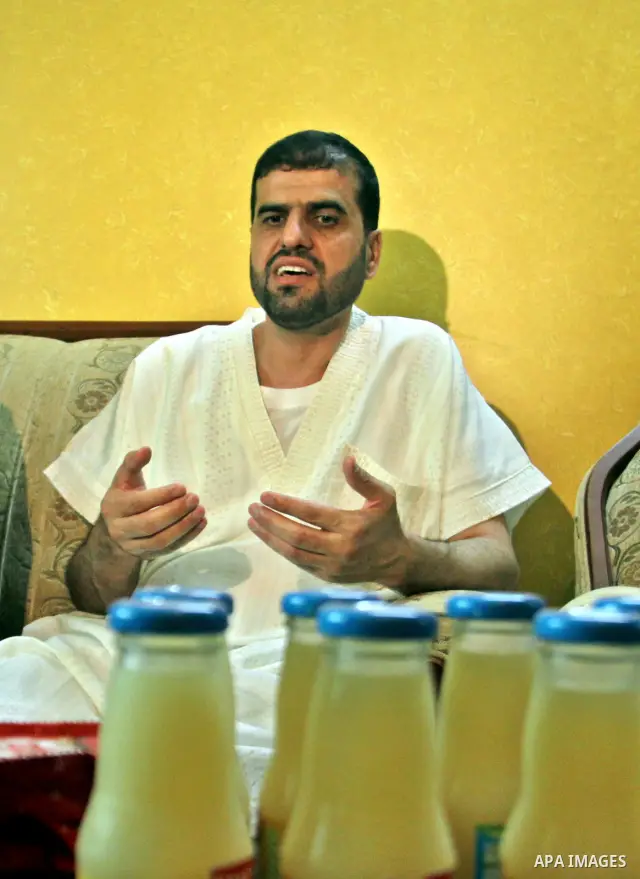 Palestinian former prisoner Adnan Asfour belonging to Hamas movement, with his family at their home in the West Bank city of Nablus, after being release of prisoners held in Israeli jails, on July 16, 2012. Photo by Neda...