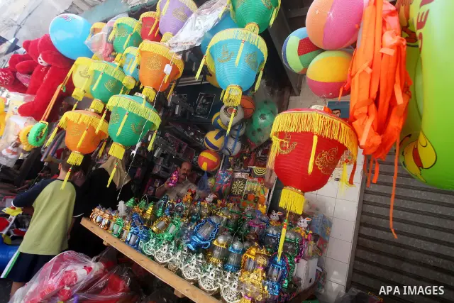 A Palestinian vendor displays goods in preparation for the holy month of Ramadan in the Gaza city on July 17, 2012 . Islam's holy month of Ramadan will begin in few days depending on the sighting of the crescent moon. Mu...