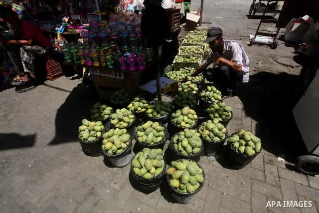 A Palestinian vendor displays goods in preparation for the holy month of Ramadan in the Gaza city on July 17, 2012 . Islam's holy month of Ramadan will begin in few days depending on the sighting of the crescent moon. Mu...