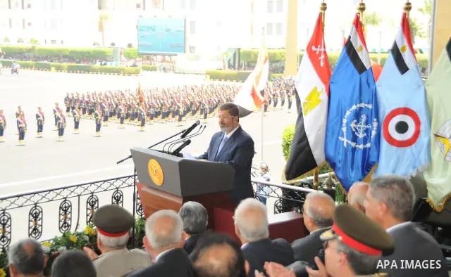 Egypt's Islamist President Mohamed Mursi speaks during a medal ceremony for graduates at the Egyptian Military Academy in Cairo July 17, 2012. Fadi Fares / Egyptian Presidency