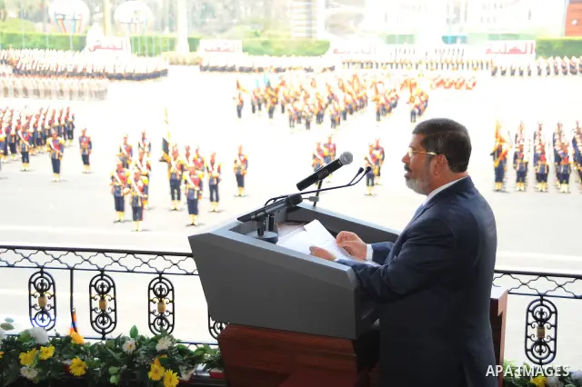Egypt's Islamist President Mohamed Mursi speaks during a medal ceremony for graduates at the Egyptian Military Academy in Cairo July 17, 2012. Fadi Fares / Egyptian Presidency