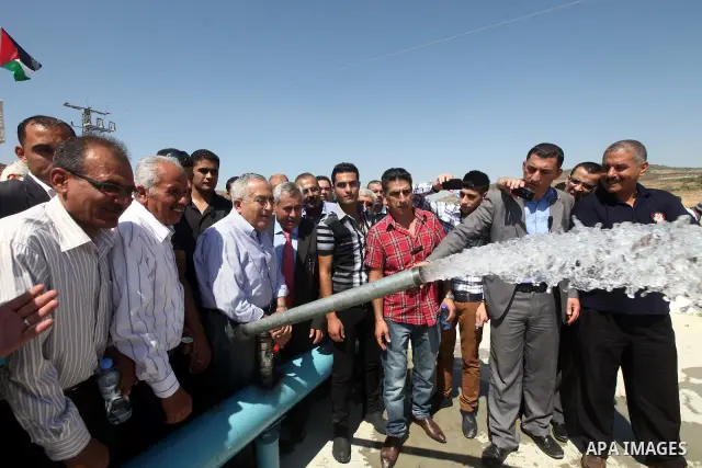 Palestinian Prime Minister, Salam Fayyad participates in the opening of the line carrier of water for the villages of Sebastia in the West Bank city of Nablus, on July, 17, 2012. Photo by Mustafa Abu Dayeh