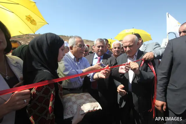Palestinian Prime Minister, Salam Fayyad participates in the opening of the line carrier of water for the villages of Sebastia in the West Bank city of Nablus, on July, 17, 2012. Photo by Mustafa Abu Dayeh