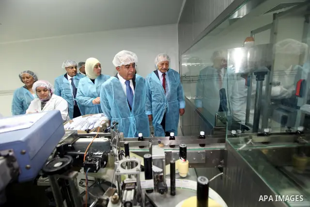 Palestinian Prime Minister Salam Fayyad during the opening new sections in Al-Quds company for medical products, in the West Bank city of Ramallah. on 18 July 2012. Photo by Mustafa Abu Dayeh