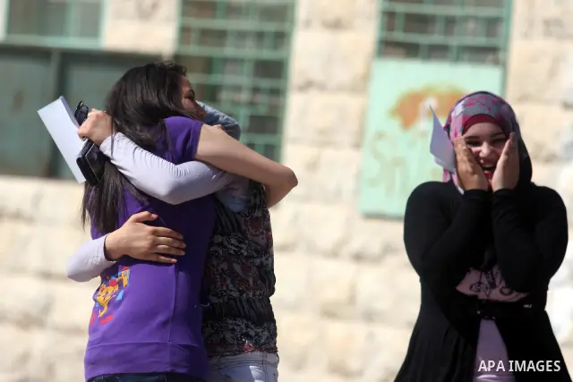 Palestinian high school student celebrated after hearing the results of their final exams known as "Tawjihi" in the West Bank city of Ramallah on July 19, 2012. The Ministry of Education in Gaza Strip and the West Bank a...