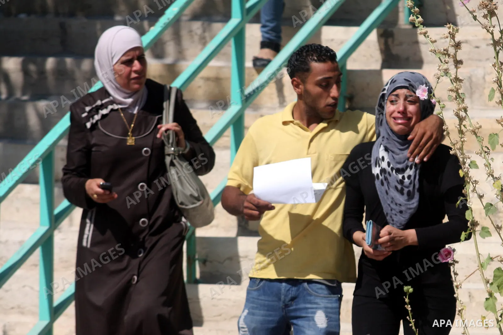 Palestinian high school student crying after find hearing the results of their final exams known as "Tawjihi" in the West Bank city of Ramallah on July 19, 2012. The Ministry of Education in Gaza Strip and the West Bank...