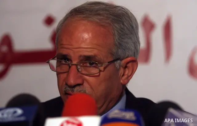 A member of the Palestinian Ministry of Education, Jihad Zakarnah speaks duing a press conference to announce the results of final high school exams, known as "Tawjihi" in the West Bank city of Ramallah,on July 19, 2012....