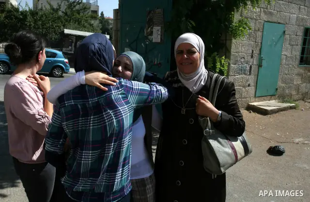 Palestinian high school student celebrated after hearing the results of their final exams known as "Tawjihi" in the West Bank city of Ramallah on July 19, 2012. The Ministry of Education in Gaza Strip and the West Bank a...
