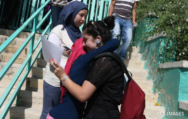 Palestinian high school student celebrated after hearing the results of their final exams known as "Tawjihi" in the West Bank city of Ramallah on July 19, 2012. The Ministry of Education in Gaza Strip and the West Bank a...