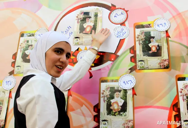 A Palestinian high school student and the first in section science , Dima Jabri, after hear her result in the West Bank City of Nablus on July 19, 2012. The Ministry of Education in Gaza Strip and the West Bank announced...