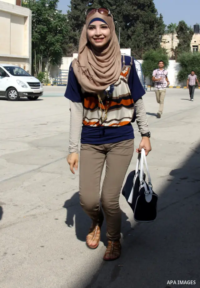 A Palestinian secondary school student and the first in section literary, Janna Saadat, after hear her result in the West Bank City of Nablus on July 19, 2012. The Ministry of Education in Gaza Strip and the West Bank an...