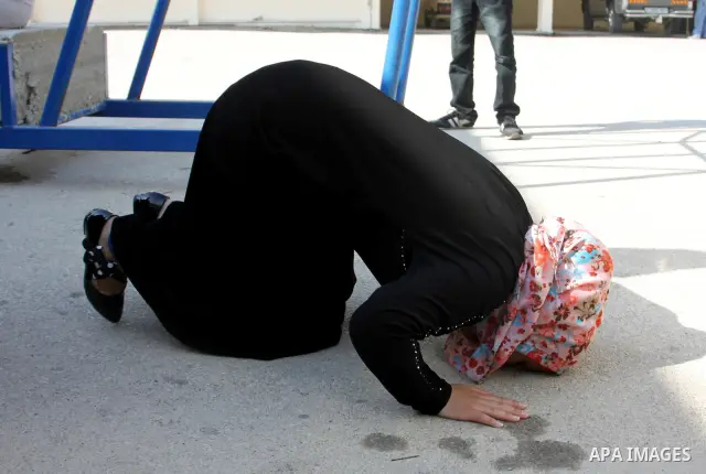 Palestinian high school students pray after heard their results of final exams known as "Tawjihi" in the West Bank city of Nablus, on July 19, 2012. The Ministry of Education in Gaza Strip announced the final results coi...