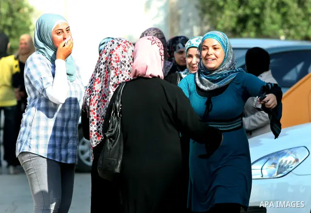 Palestinian high school students take hug after heard their results of final exams known as "Tawjihi" in the West Bank city of Nablus, on July 19, 2012. The Ministry of Education in Gaza Strip announced the final results...