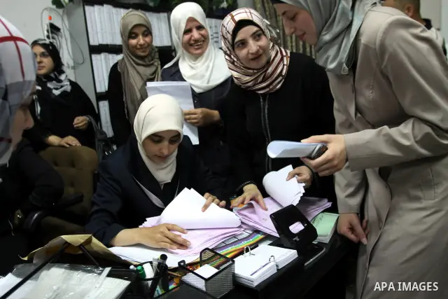 Palestinian students looking for results of their final exams known as ''Tawjihi'' in the West Bank city of Hebron, on July 19, 2012. The Ministry of Education in Gaza Strip announced the final results coincide with the...