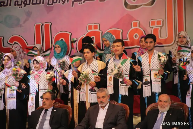 Palestinian Prime Minister in Gaza Ismail Haniyeh attends the ceremony for superior high school students in Gaza city, on 19 July 2012. The Ministry of Education in Gaza Strip announced the final results of high school f...