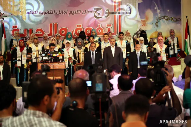 Palestinian Prime Minister in Gaza Ismail Haniyeh attends the ceremony for superior high school students in Gaza city, on 19 July 2012. The Ministry of Education in Gaza Strip announced the final results of high school f...