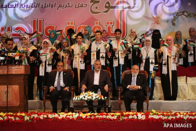 Palestinian Prime Minister in Gaza Ismail Haniyeh attends the ceremony for superior high school students in Gaza city, on 19 July 2012. The Ministry of Education in Gaza Strip announced the final results of high school f...
