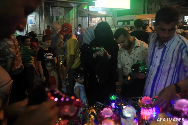 A Palestinian muslim Family buy electric lights for the month of Ramadan, in preparation for the muslim holy month, at the old market on 19 July 2012 in gaza city. Ramadan is the ninth month of the Islamic calender, a mo...