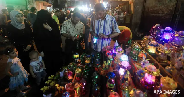 A Palestinian muslim Family buy electric lights for the month of Ramadan, in preparation for the muslim holy month, at the old market on 19 July 2012 in gaza city. Ramadan is the ninth month of the Islamic calender, a mo...