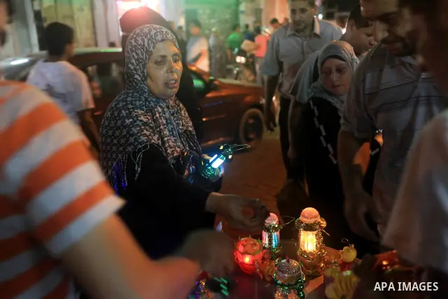 A Palestinian muslim Family buy electric lights for the month of Ramadan, in preparation for the muslim holy month, at the old market on 19 July 2012 in gaza city. Ramadan is the ninth month of the Islamic calender, a mo...