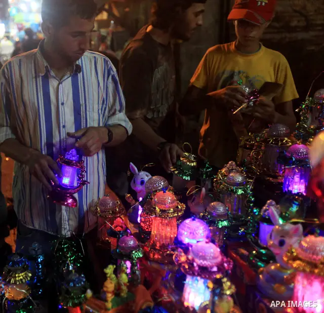 A Palestinian muslim Family buy electric lights for the month of Ramadan, in preparation for the muslim holy month, at the old market on 19 July 2012 in gaza city. Ramadan is the ninth month of the Islamic calender, a mo...
