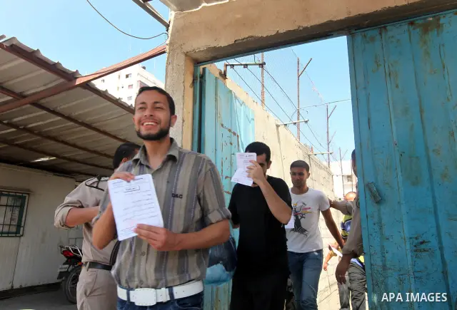Palestinian prisoners prepare to be freed from a Hamas-run jail in Gaza City on July 21, 2012. Palestinian Hamas police released prisoners because of the approaching holy month of Ramadan. Photo by Momen Faiz