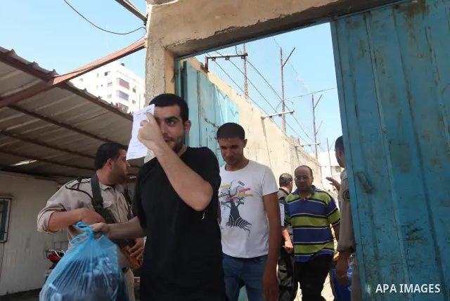 Palestinian prisoners prepare to be freed from a Hamas-run jail in Gaza City on July 21, 2012. Palestinian Hamas police released prisoners because of the approaching holy month of Ramadan. Photo by Momen Faiz