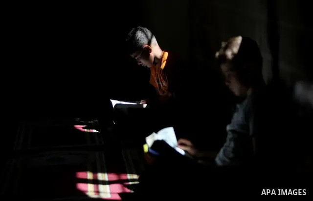 Palestinian children read the holy Qur'an at a mosque in Gaza city, on 21 July 2012. Muslims around the world refrain from eating, drinking and sexual intercourse from dawn till dusk during Ramadan, the holiest month in...