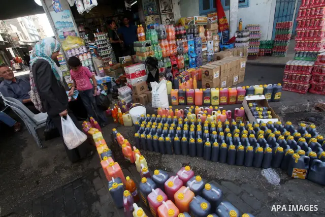 Palestinians shop at the traditional market in Gaza city on the second day of the holy month of Ramadan,on 21 July 2012. Muslims around the world abstain from eating, drinking and conducting sexual relations from dawn ti...