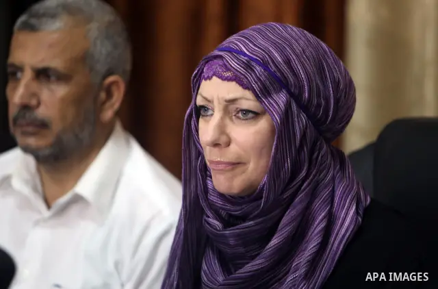 British citizen Anne Kennedy, 49, at the headquarters of the Palestinian Muslim Scholars association in Gaza city July 21, 2012 during a press conference to announcing her conversion to Islam in during the holy month of...