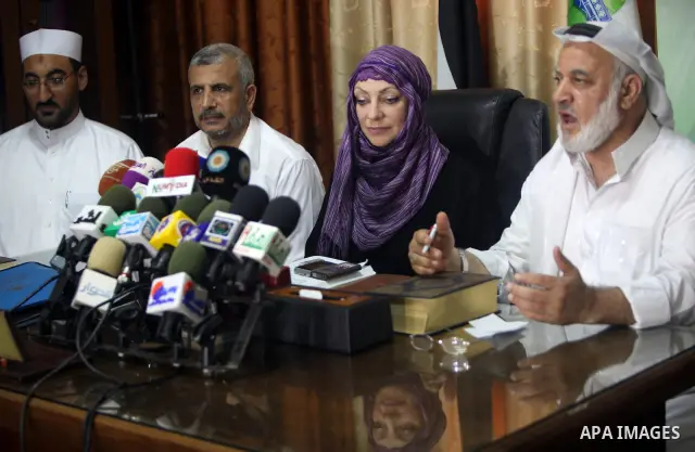 British citizen Anne Kennedy, 49, at the headquarters of the Palestinian Muslim Scholars association in Gaza city July 21, 2012 during a press conference to announcing her conversion to Islam in during the holy month of...
