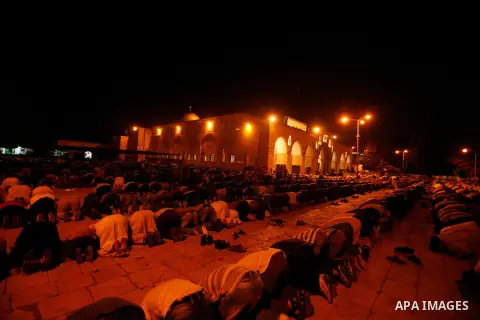 Palestinian worshippers attend night prayer at al-Aqsa Mosque in Jerusalem's Old City on the second day of the holy month of Ramadan, on 21 July 2012. Muslims around the world abstain from eating, drinking and conducting...