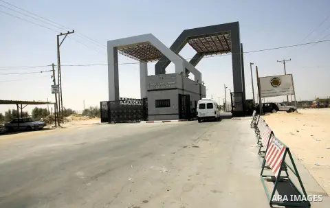 Palestinians wait the buses to cross to Egypt through the Rafah border crossing between the Gaza Strip and Egypt in Gaza city, on 24 July 2012. Egyptian Ambassador of Arab Republic , of the Palestinian Authority, Yasser...