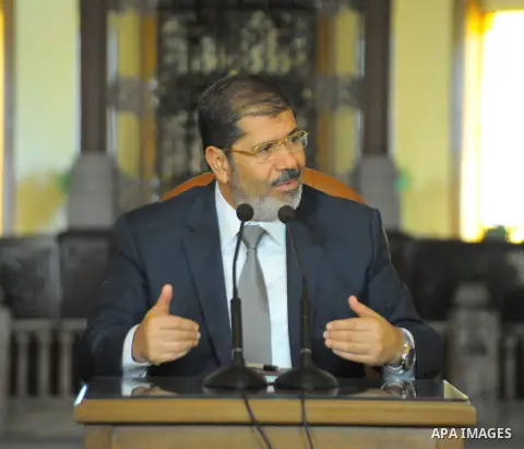 Egyptian President Mohamed Morsi delivering a speech to the Egyptian Labour and Union representatives at the Presidential Palace in Cairo, on July 25, 2012. Photo by Mohammed Smaha \ EGYPTIAN PRESIDENCY