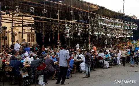 Egyptian people getting ready for break their fast at the dinner table, in Cairo on 26 July 2012. Egyptians prepare to have an break their fast meal during fasting holy month of Ramadan, which is the Muslim month of fast...