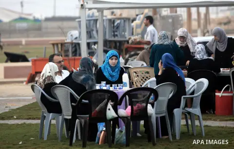 Palestinians getting ready for break their fast at Gaza beach during the fasting holy month of Ramadan, in Gaza city on 26 July 2012. Muslims throughout the world are celebrating the fasting month of Ramadan, the holiest...